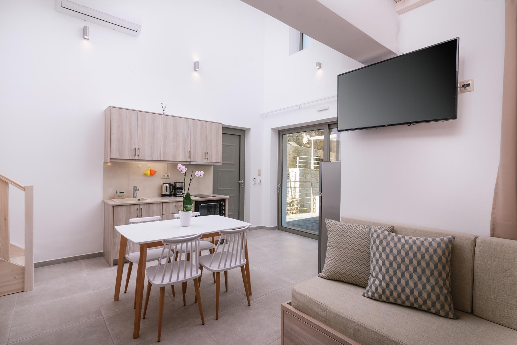 TV Above Sofa | Matala Prime Villas | Matala Greece
